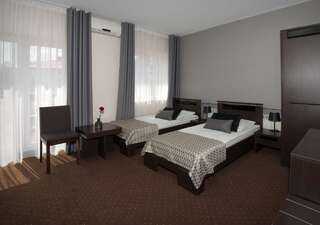 Отель Hotel Capitol Бяла-Подляска Двухместный номер с 1 кроватью или 2 отдельными кроватями-8