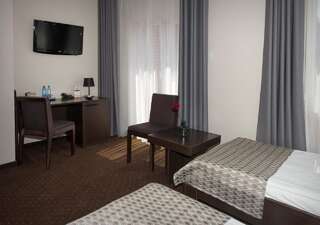 Отель Hotel Capitol Бяла-Подляска Двухместный номер с 1 кроватью или 2 отдельными кроватями-9